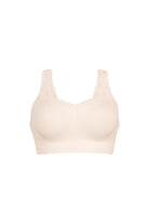 Beige bralette mastectomy bra on a white background